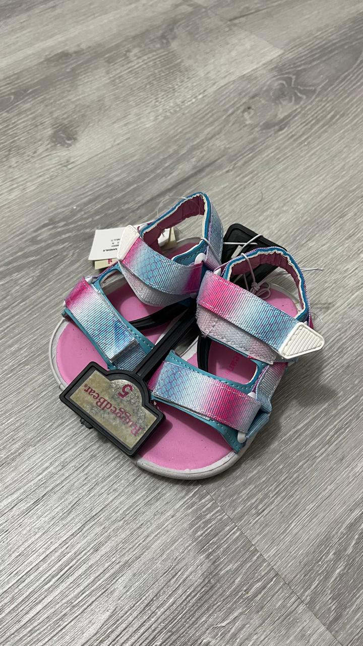 Sandalias azul y rosada